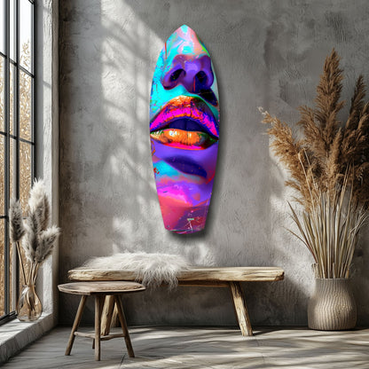 Vibrant neon lips glass wall art mounted on gray textured wall above wooden bench in minimalist room setting.