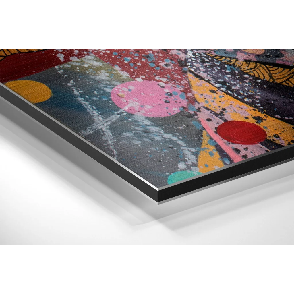 Vibrant abstract art on brushed aluminium dibond print with bold pink, red, yellow, teal splashes on textured dark gray