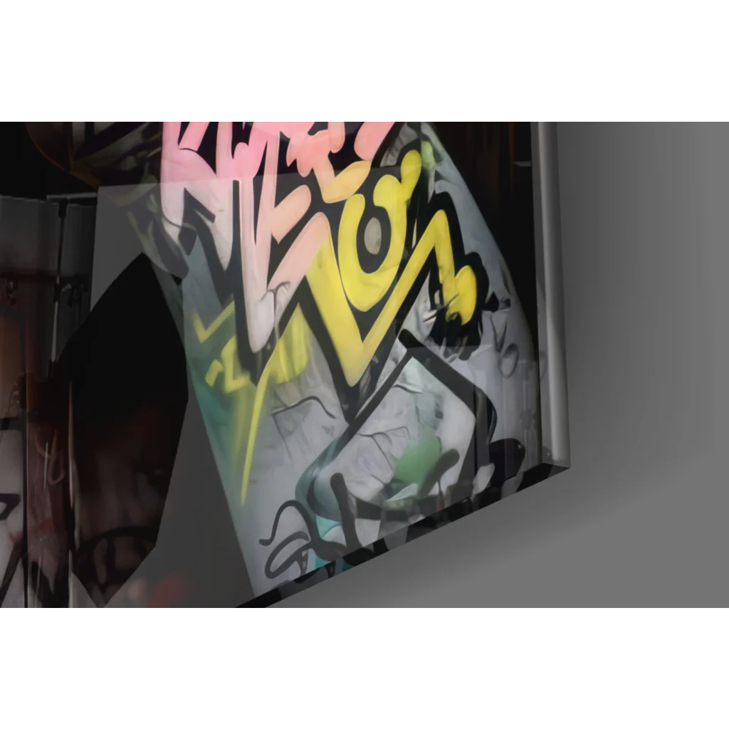 Vibrant graffiti wall art of colorful urban woman in yellow, pink, green on gray canvas