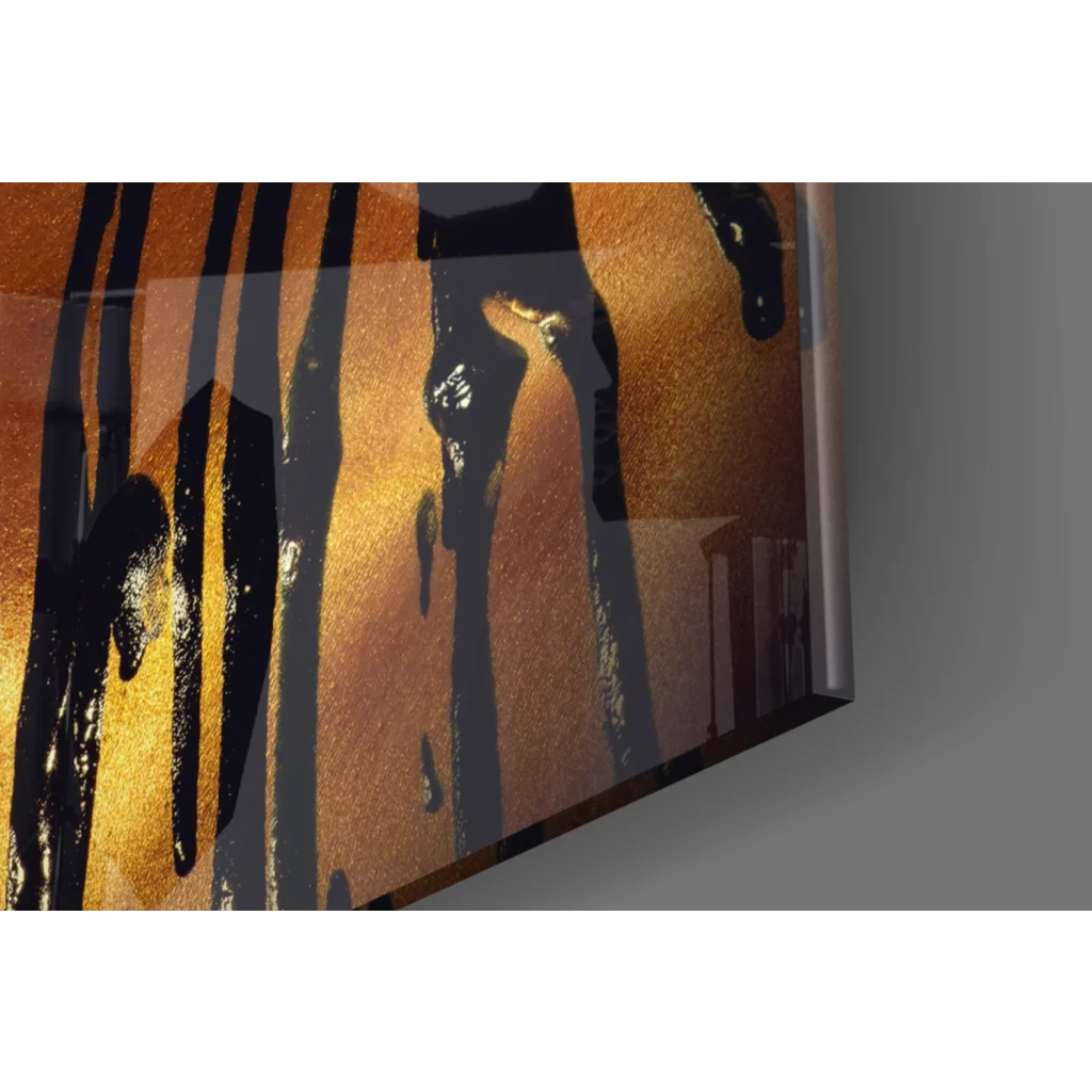 Modern abstract black streaks on gold background in stunning glass wall art