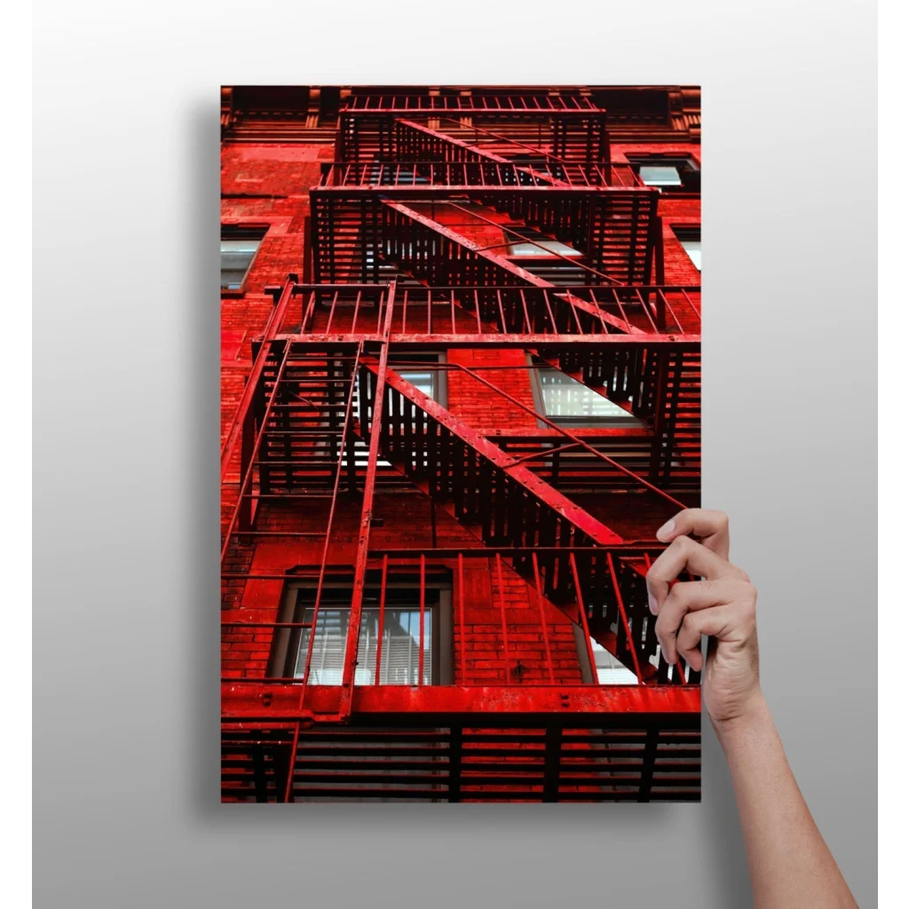 Vibrant red fire escape insigne aluminum print on wall