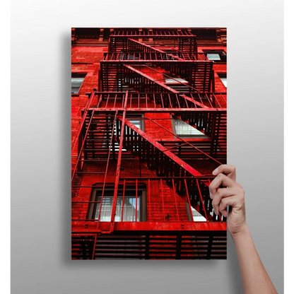 Vibrant red fire escape insigne aluminum print on wall