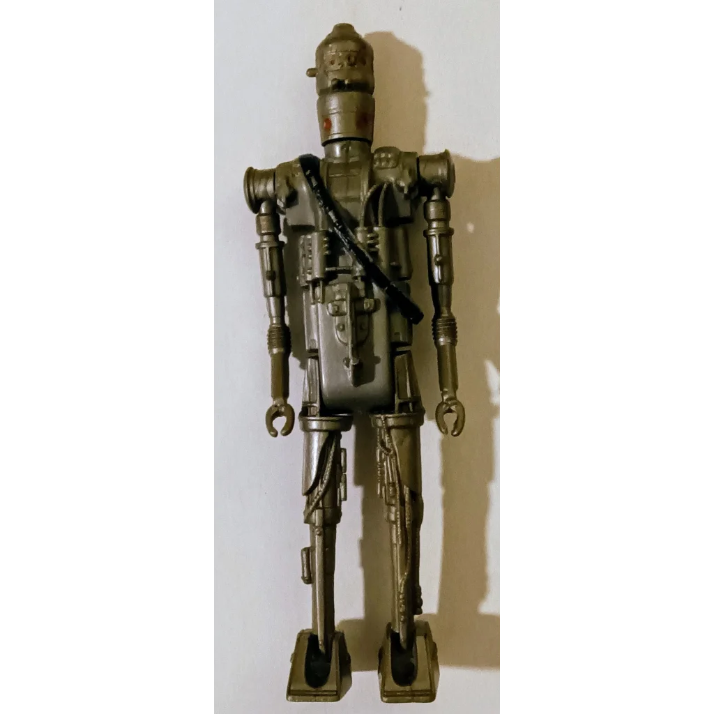 Vintage 1980 Kenner IG-88 Star Wars action figure with green and brown armor
