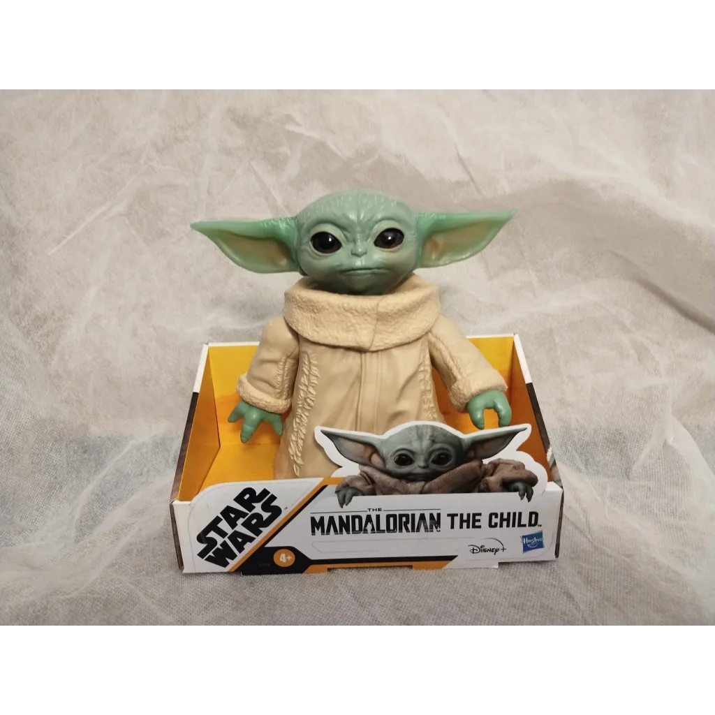 Star Wars posable figure of The Child in beige robe