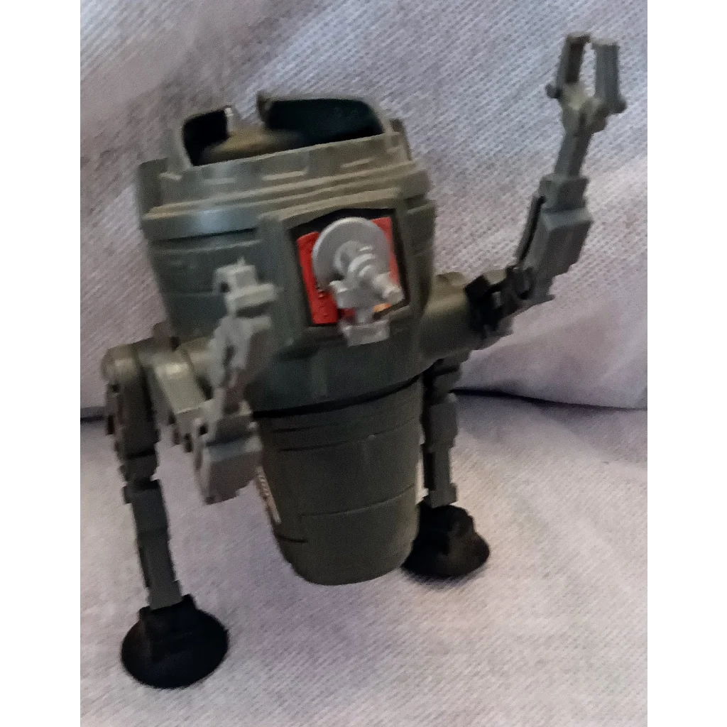 Green and gray Star Wars vehicle robot toy with red accents