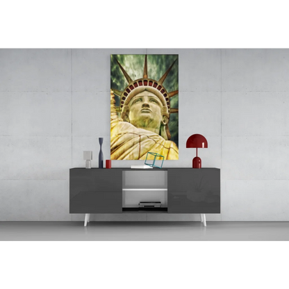 Golden Statue of Liberty glass wall art on gray console