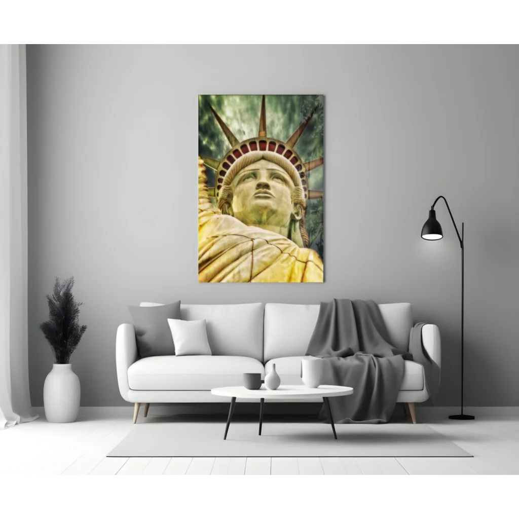 Golden Statue of Liberty glass wall art print on gray wall