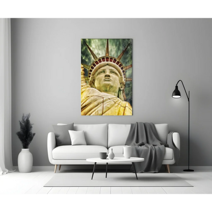 Golden Statue of Liberty glass wall art print on gray wall