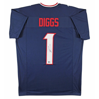 Autographed dark blue Stefon Diggs signed jersey with DIGGS and 1 in red, collectible