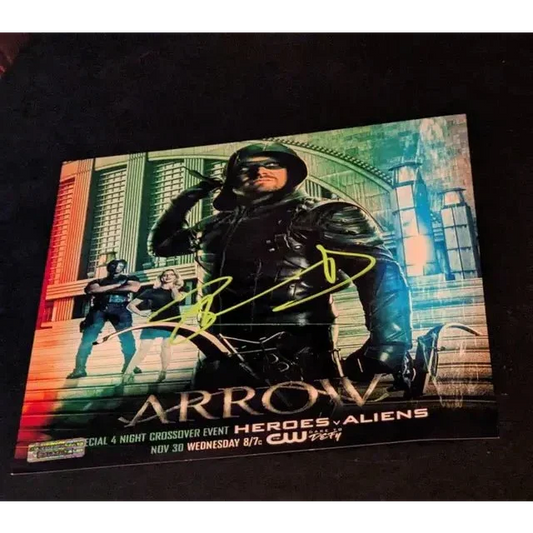 Autographed Arrow TV series poster featuring Stephen Amell with signed baseballs, 8x10 photo