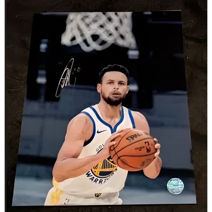 Stephen Curry autographed 8x10 photo in Warriors uniform holding basketball
