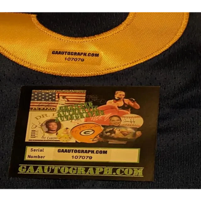 Stephen Curry autographed jersey with authentication sticker and tag on blue jersey