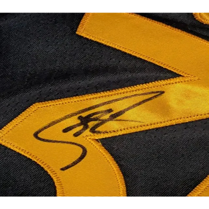 Stephen Curry autographed jersey in black and gold, authenticated Curry autographed jersey
