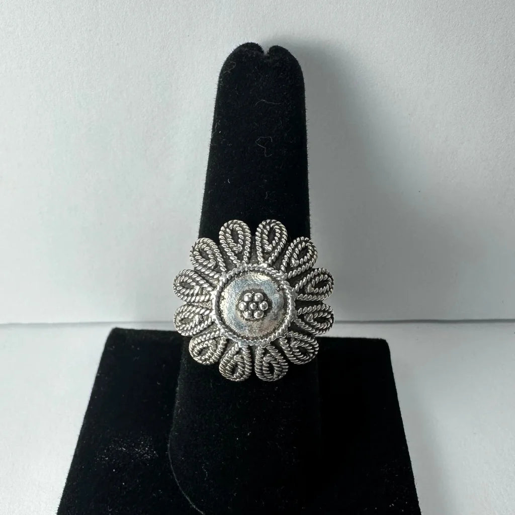 Sterling silver flower ring with twisted filigree petals