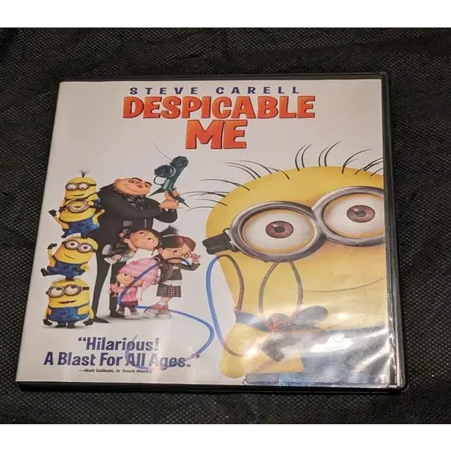Steve Carell signed Despicable Me DVD with yellow Minion on cover and holographic dust