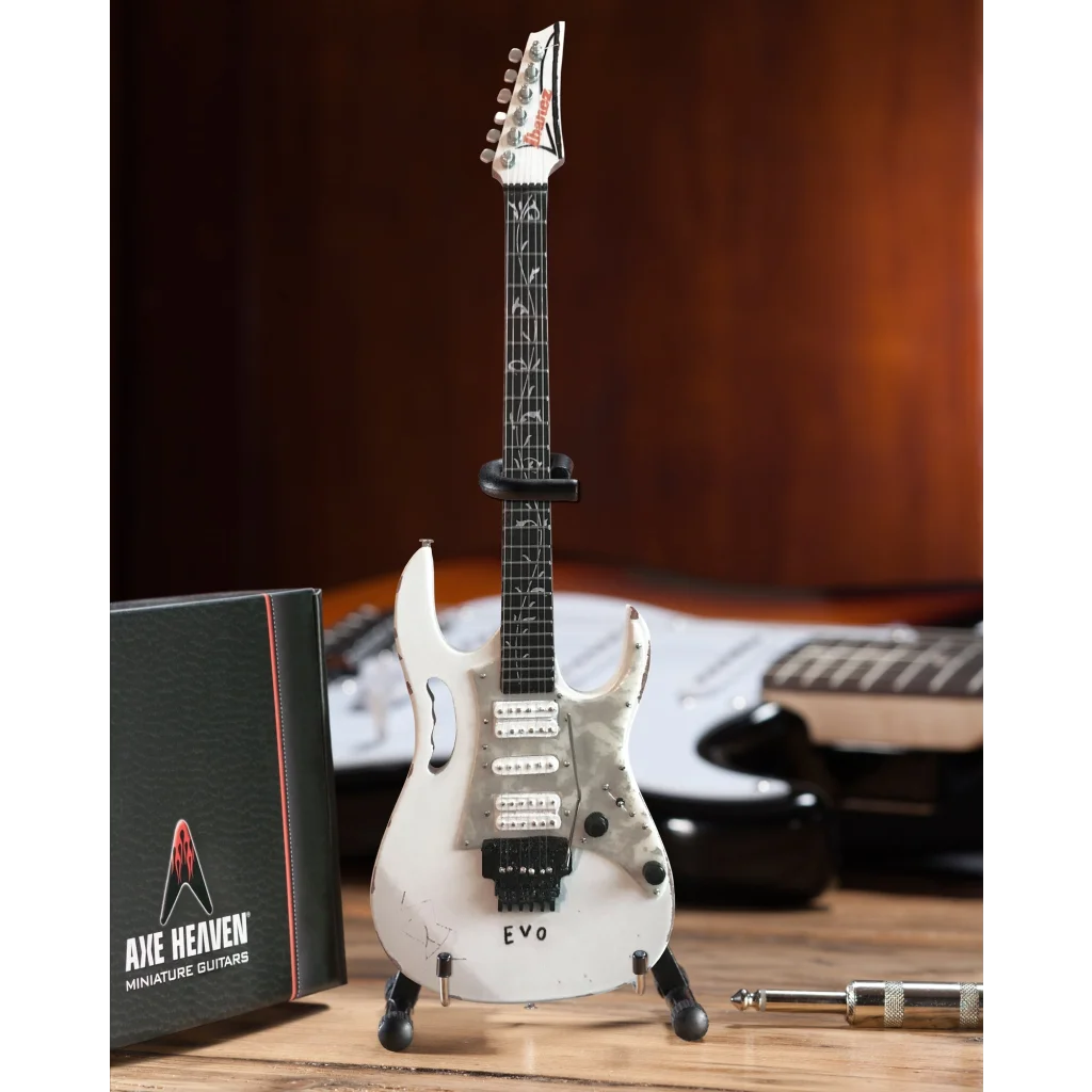 Mini white Steve Vai EVO guitar by Axe Heaven® with adjustable A-frame stand