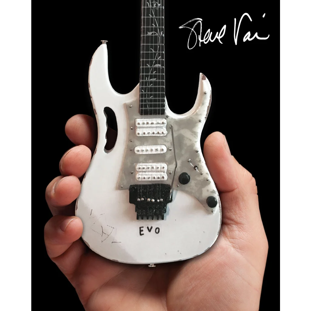 White Steve Vai EVO Mini Guitar by Axe Heaven with adjustable A-frame stand