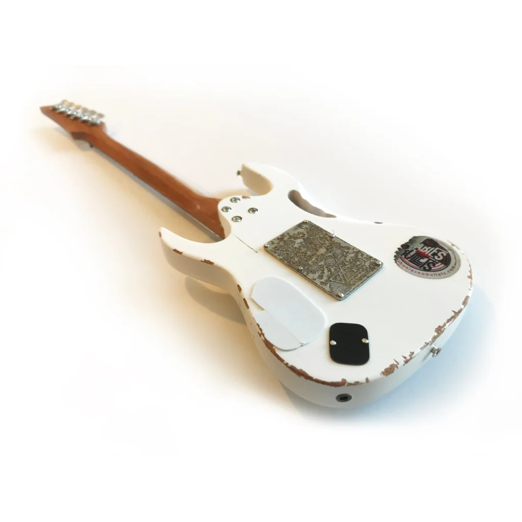 White Steve Vai EVO Mini Guitar by Axe Heaven® with adjustable A-frame stand