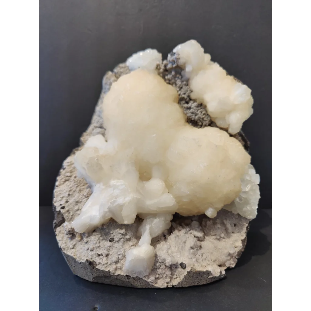 Stilbite heart with clear apophyllite on creamy white crystal matrix base