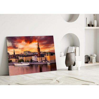 Stunning glass wall art print of vibrant sunset cityscape