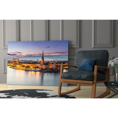 Stockholm twilight waterfront glass wall art canvas print with spire reflection
