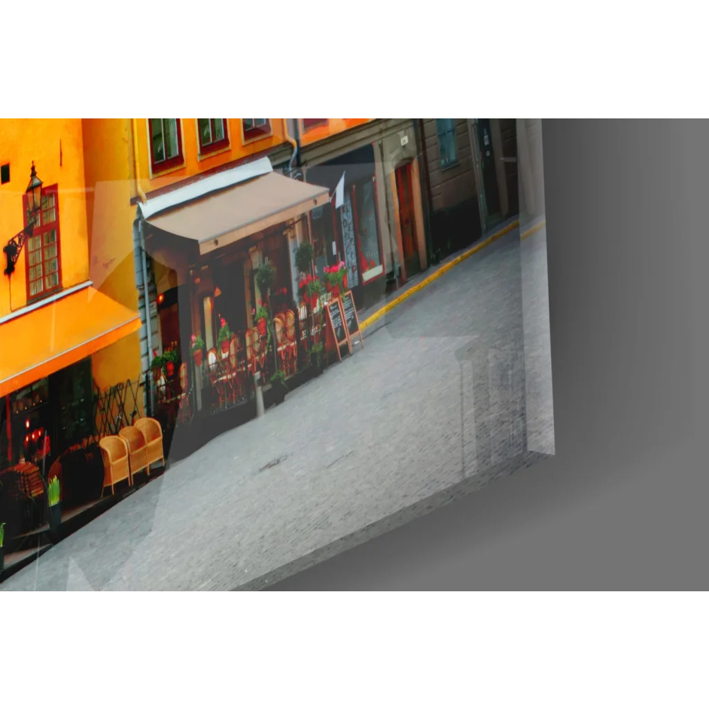 Vibrant orange awning on cozy European cafe in colorful glass wall art print