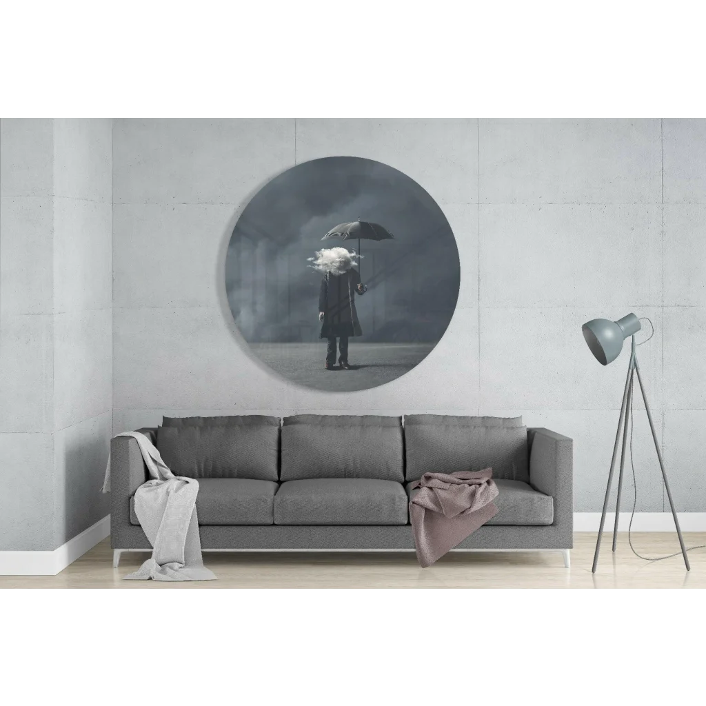 Stunning white-haired figure with umbrella in circular black-and-white tempered glass art above gray sofa