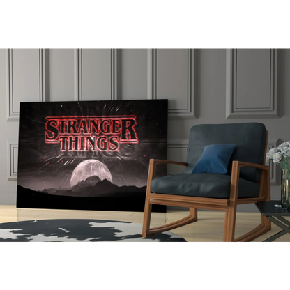 Stranger Things neon logo wall art on black canvas with moon and starry mountains