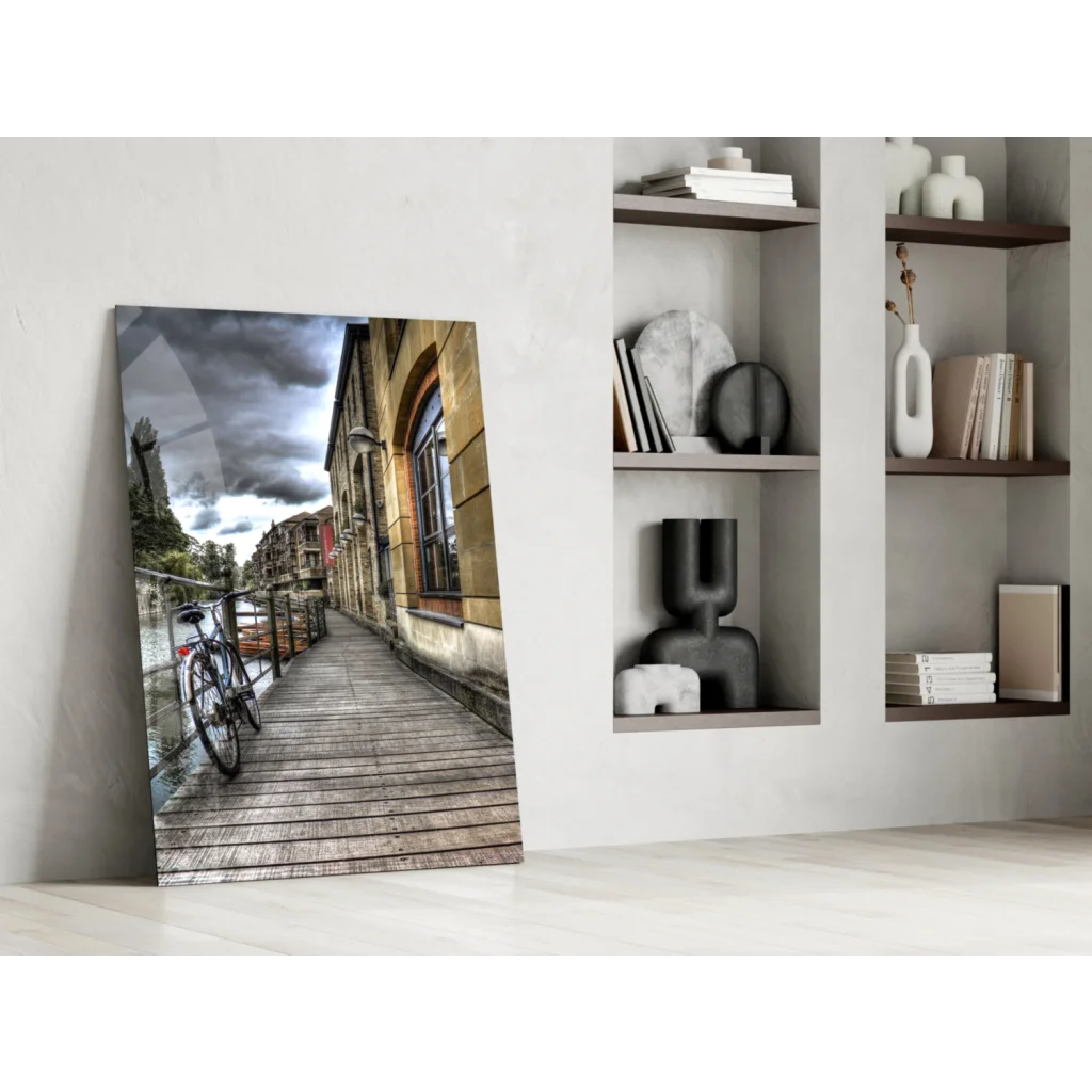 Dramatic cobblestone street glass wall art with vintage bicycle