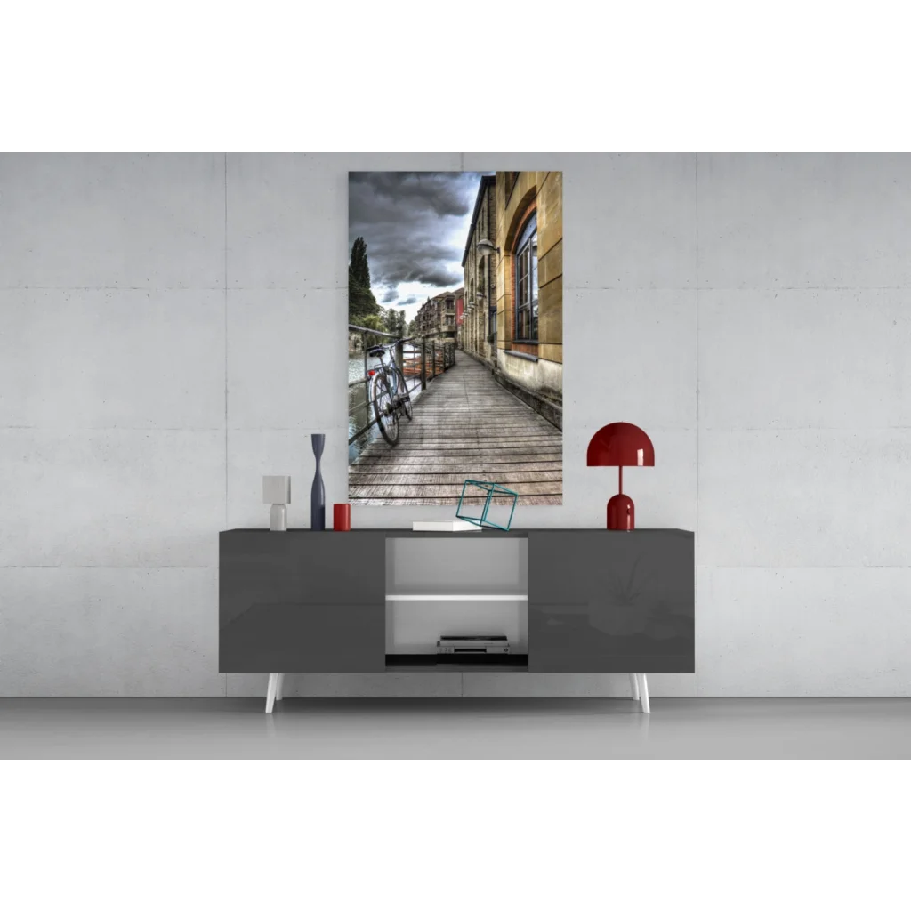 Dramatic cobblestone street glass wall art with vintage bicycle