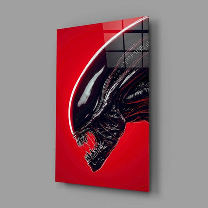 Striking red alien head glass wall art print on black background
