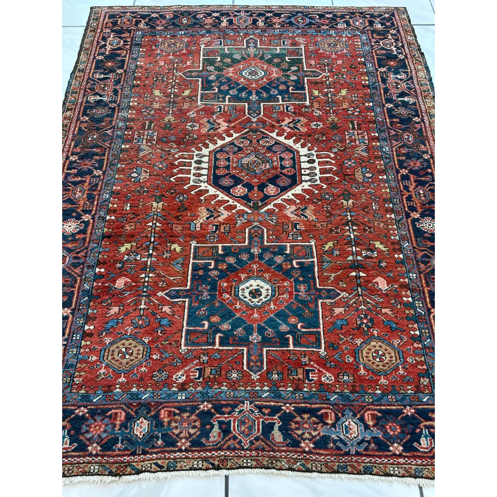 Vintage 1900s Persian Karaja rug in red navy with bold medallion