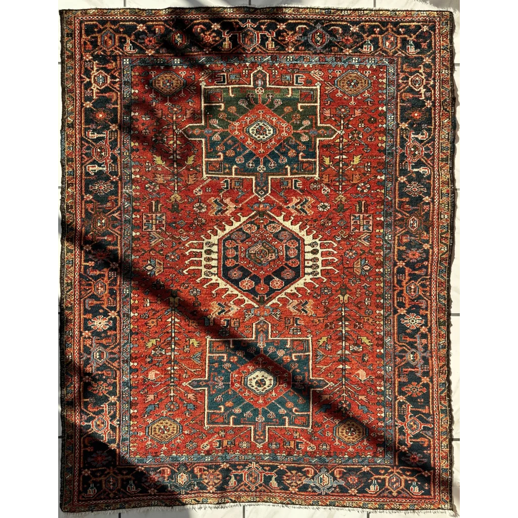 Stunning 1900s Persian Karaja rug with bold red medallion