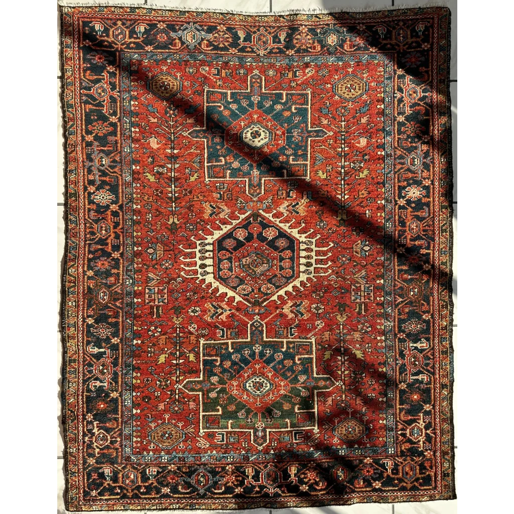 Stunning 1900s Persian Karaja rug with bold red medallion