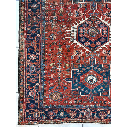 Vibrant red and blue 1900s Persian Karaja rug with bold medallion