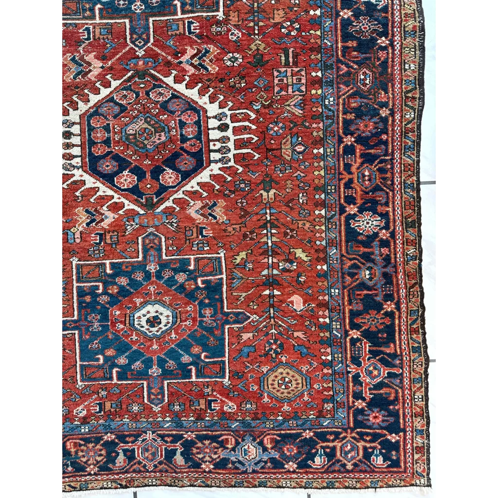 Stunning 1900s Persian Karaja rug with bold red medallion and intricate motifs