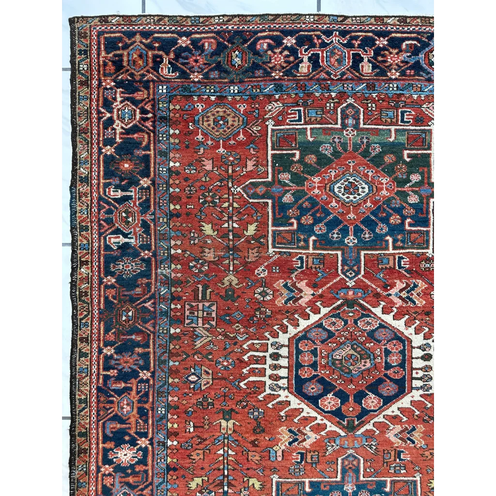 Stunning 1900s Persian Karaja rug with bold red medallion and intricate patterns
