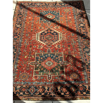 Stunning 1900s Persian Karaja rug with bold red medallion