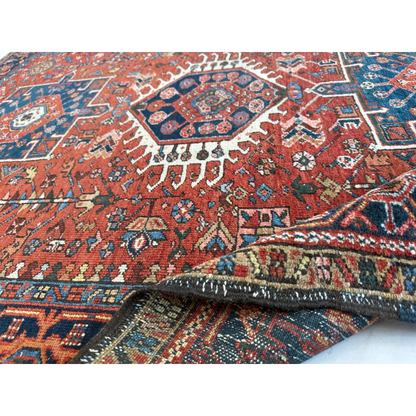 Vibrant 1900s Persian Karaja rug in red and blue with bold medallion