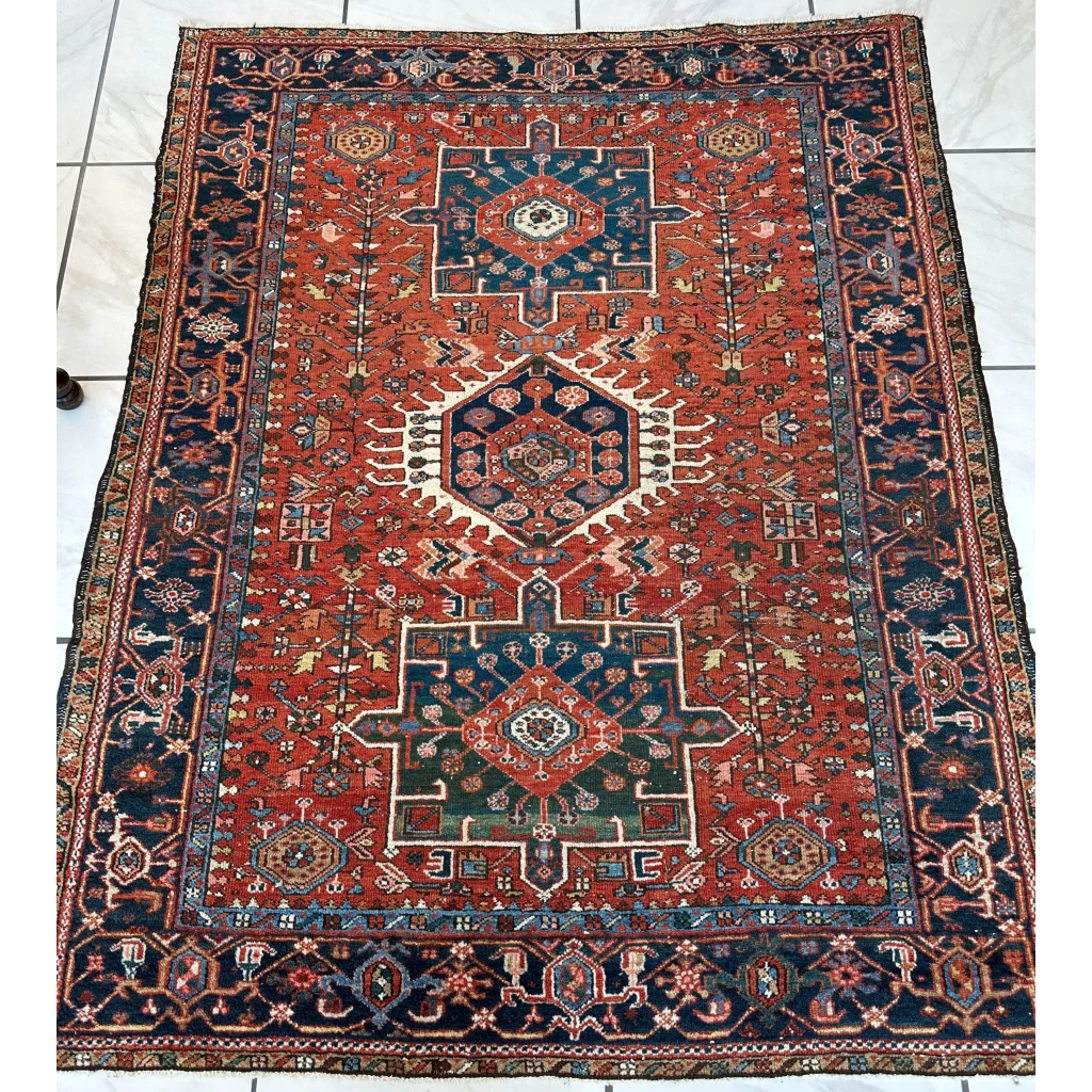 Vintage 1900s Persian Karaja rug with bold red medallion and intricate patterns