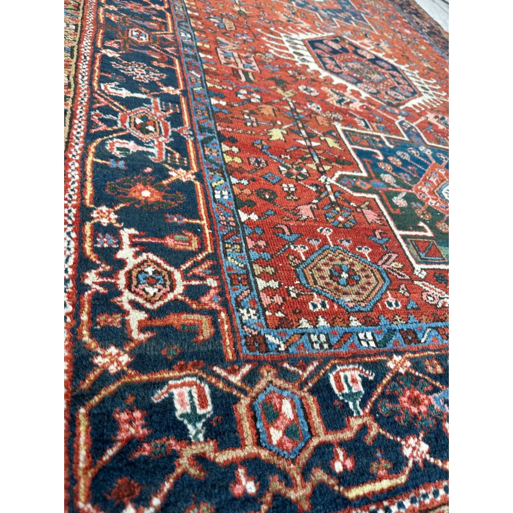 Stunning 1900s Persian Karaja rug with bold red medallion and intricate patterns