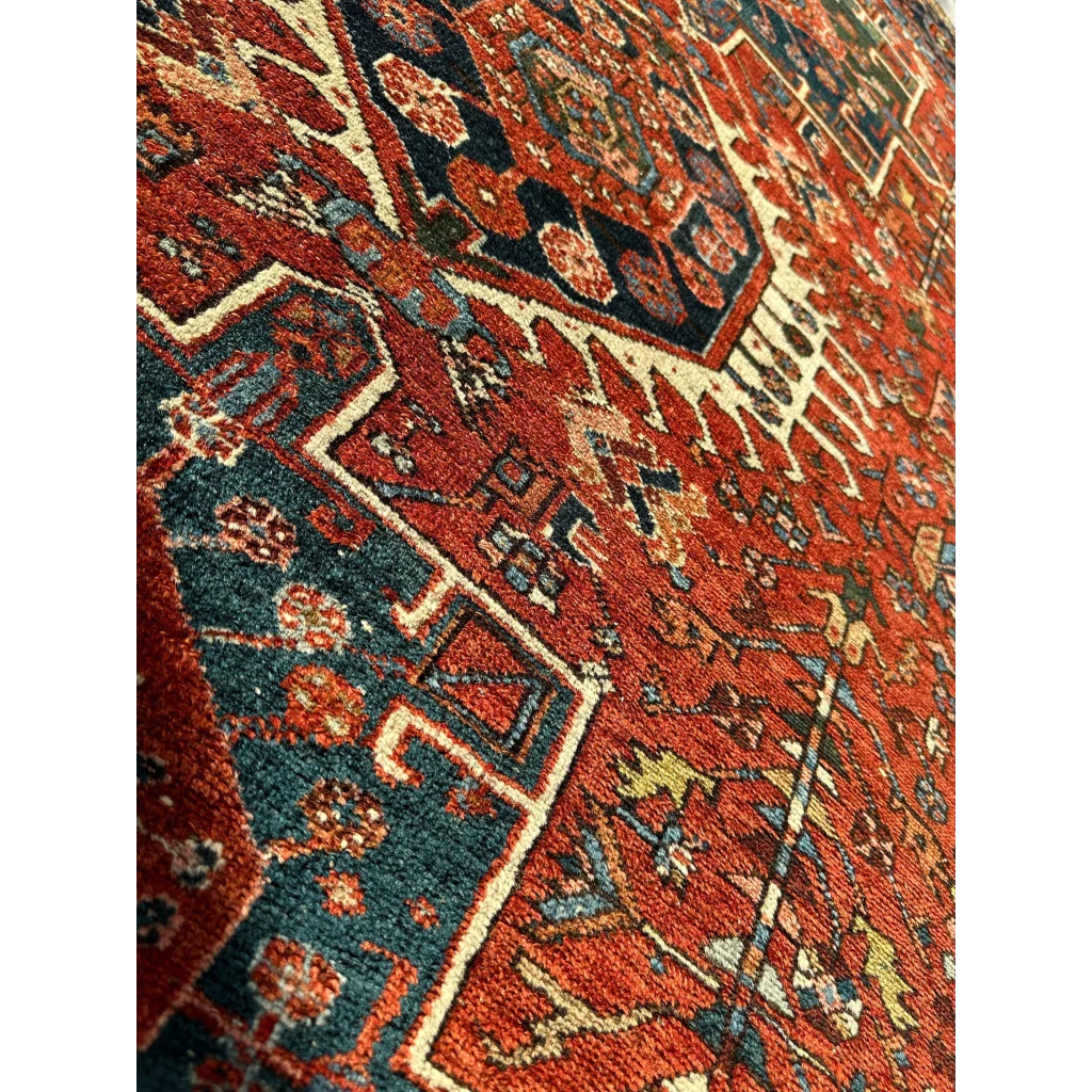 Stunning 1900s Persian Karaja rug with bold red medallion and intricate patterns