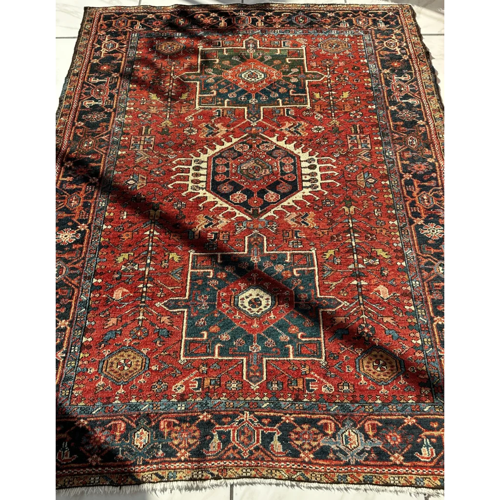 Stunning 1900s Persian Karaja rug in bold red medallion