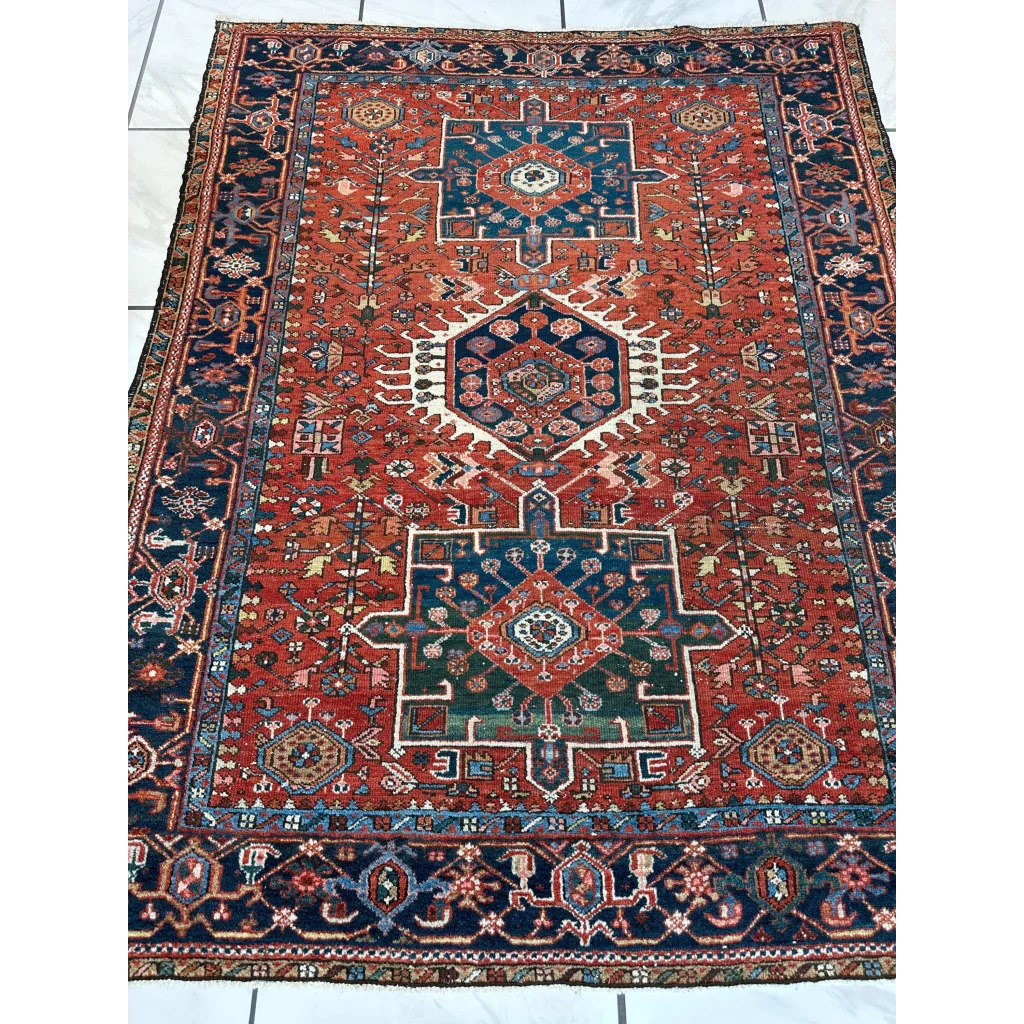 Stunning 1900s Persian Karaja rug with bold red medallion