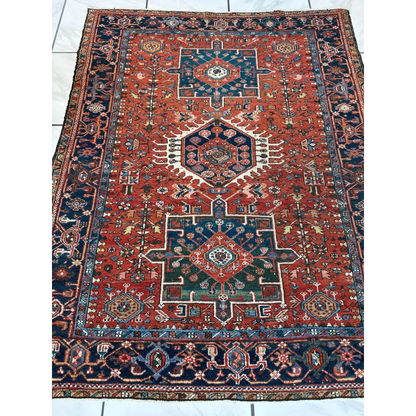 Stunning 1900s Persian Karaja rug with bold red medallion