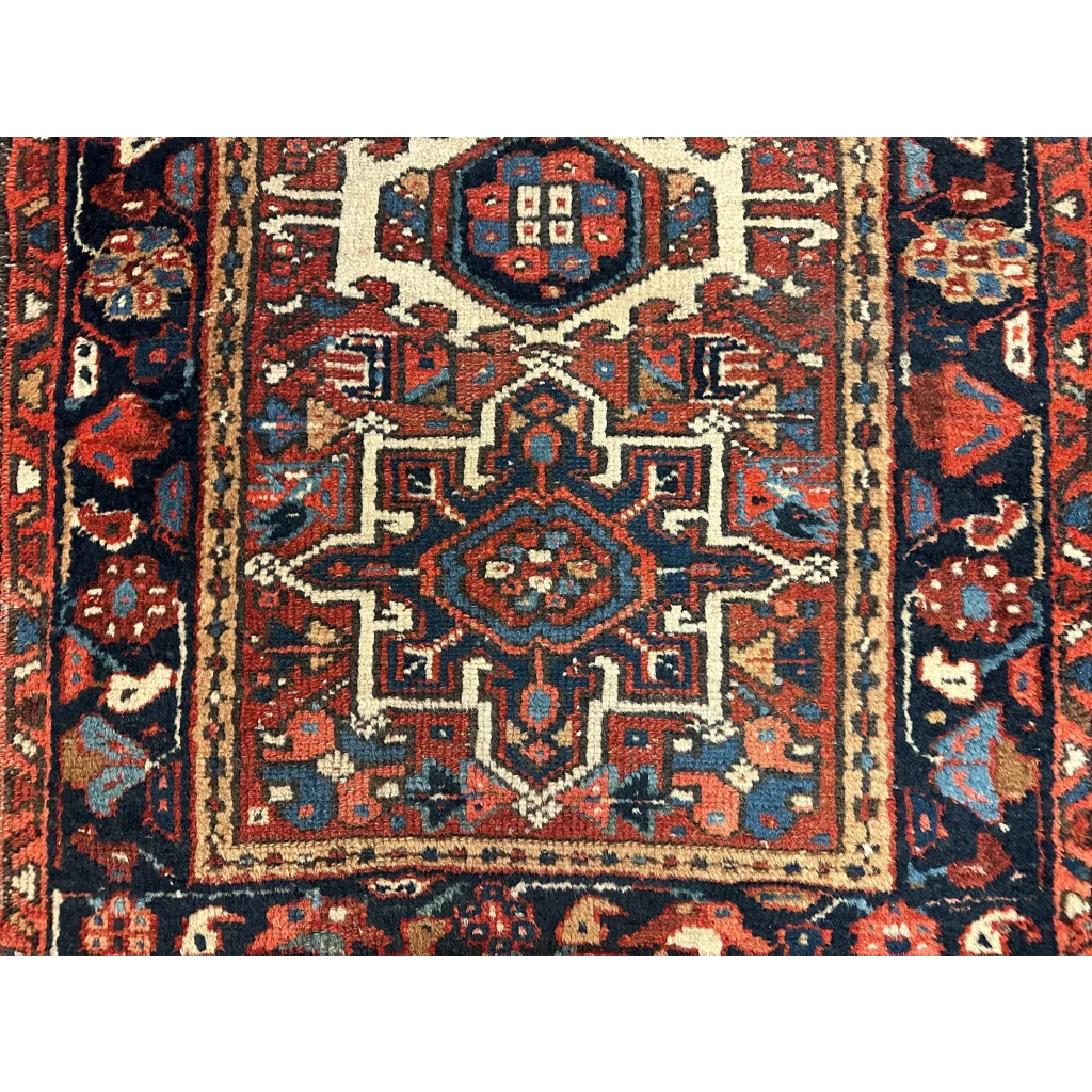 Stunning 1900s Persian Karaja rug with intricate geometric floral patterns in rich jewel tones