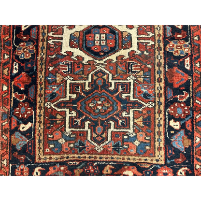 Stunning 1900s Persian Karaja rug with intricate geometric floral patterns in rich jewel tones