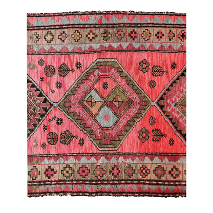 Antique Caucasian runner 1910s, close-up of vibrant pink geometric floral patterns, natural dyes