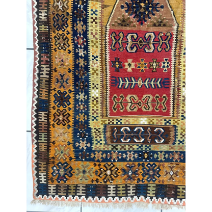 Antique 1920s Anatolian wool prayer rug with geometric patterns and low pile