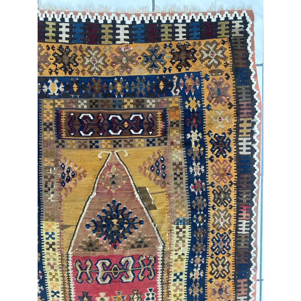 Vibrant 1920s antique Anatolian wool prayer rug with geometric patterns